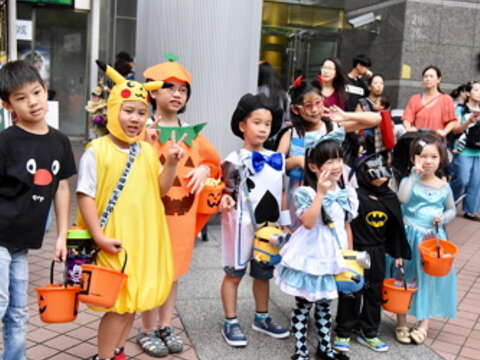 kids dressed up in Halloween costumes